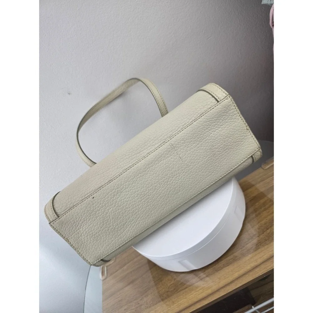 Dooney & Bourke Cream Pebbled Leather Barrel Shoulder Bag Marbled Lining